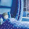 A child sleeps in a starry bed, cuddling a toy cat beside a window with a moonlit cityscape. The tranquil scene from "Sweet Dreams" by Schiffer Publishing, Ltd. feels ideal for children's books or bedtime poems.