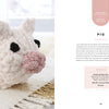 A plush, handmade pink pig—crafted from chunky yarn—rests on a cream and yellow rug. The right page of "Get Started in Finger Knitting" by Schiffer Publishing, Ltd. includes instructions and a supply list for creating the pig.