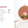 Schiffer Publishing, Ltd.'s "Felt Craft Fun" features a beginner-friendly embroidery hoop with felt art of a red and white mushroom in a glass terrarium, grass, and clouds—complete with wooden beads, necklace, and step-by-step instructions.