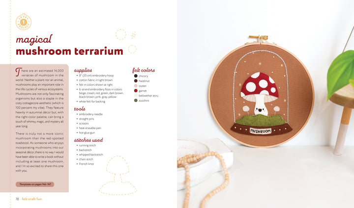 Schiffer Publishing, Ltd.'s "Felt Craft Fun" features a beginner-friendly embroidery hoop with felt art of a red and white mushroom in a glass terrarium, grass, and clouds—complete with wooden beads, necklace, and step-by-step instructions.
