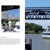 A group enjoys a scenic cruise on the Cuyahoga River under a city bridge—an experience featured in "101 Things to Do in Cleveland" by Schiffer Publishing, Ltd.