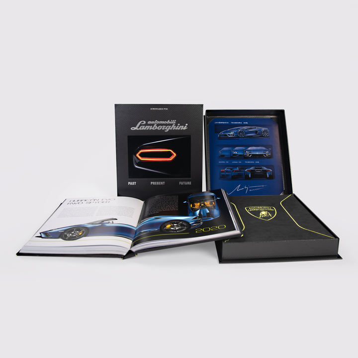 The Automobili Lamborghini Special Edition by Schiffer Publishing, Ltd. features a book, booklet, illuminated emblem, exclusive sketches, and signature—all in a collector’s box celebrating the stories and images of Lamborghini supercars.