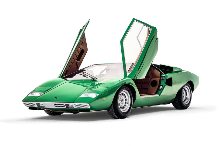 The Automobili Lamborghini Special Edition by Schiffer Publishing, Ltd. features a classic green Countach luxury sportscar with iconic scissor doors open, showcased on a white background.