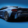 A sleek, futuristic silver sports car with angular lines and large wheels appears from the rear on a blue backdrop. The Automobili Lamborghini Special Edition by Schiffer Publishing, Ltd. boasts bold red tail lights and a "TEMPERAUD" license plate.
