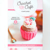 The Schiffer Publishing, Ltd. Crochet Cafe Amigurumi Kit Cupcake is a pink and white box with a cupcake image. It includes yarn, stitch marker, crochet hook, needle, and fiberfill—great for beginners.