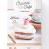 The Crochet Cafe Amigurumi Kit Cake Slice by Schiffer Publishing, Ltd. is a beginner crochet kit that includes yarn, needle, stitch marker, crochet hook, fiberfill, and makes a cute cake slice with a strawberry on top.