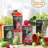 The Crochet Your Veggies Amigurumi Kit Carrot by Schiffer Publishing, Ltd. is shown with finished carrot, avocado, and radish amigurumi, yarn, hooks, and a tipped plant pot, plus a “Collect the whole set!” sign in the upper right.