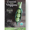The Schiffer Publishing, Ltd. Crochet Your Veggies Amigurumi Kit Peapod features a green crocheted peapod with three peas, is great for beginners, and includes a crochet hook, yarn, stitch marker, needle, and fiberfill.