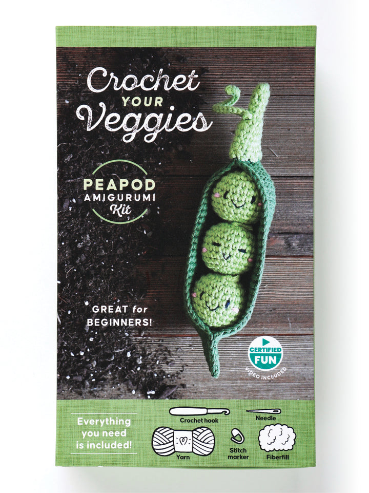 The Schiffer Publishing, Ltd. Crochet Your Veggies Amigurumi Kit Peapod features a green crocheted peapod with three peas, is great for beginners, and includes a crochet hook, yarn, stitch marker, needle, and fiberfill.
