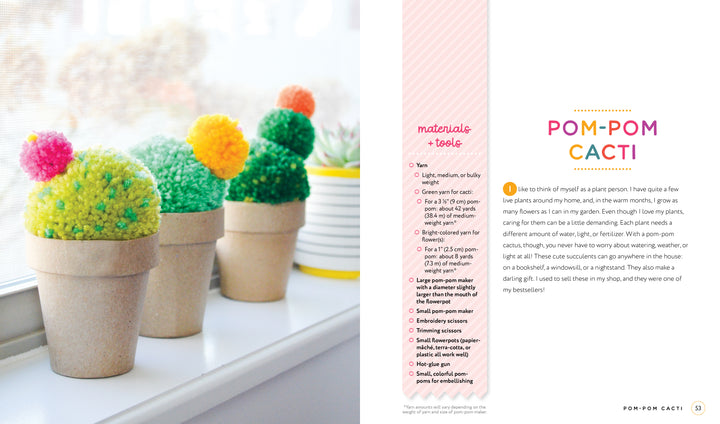 Handmade Happiness Yarn Crafts by Schiffer Publishing, Ltd. features three soft pom-pom cacti—yellow, green, and two-tone green—in small brown pots, each decorated with pins for a creative home décor accent.