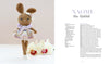 A crocheted brown amigurumi rabbit doll in a pastel dress stands by white orchids. Pattern instructions and the title “Sweet and Simple Amigurumi Friends” from Schiffer Publishing, Ltd. are shown on the right.