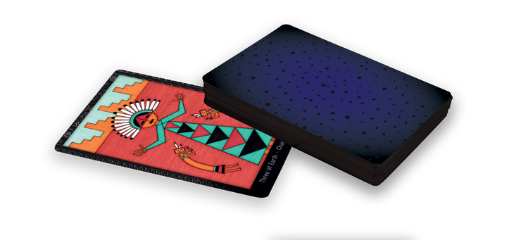 The Dark Daughter Tarot by Schiffer Publishing, Ltd. features the Three of Earth card face up, showing a colorful abstract figure with geometric patterns on a red background, while the rest of the deck remains stacked face down.