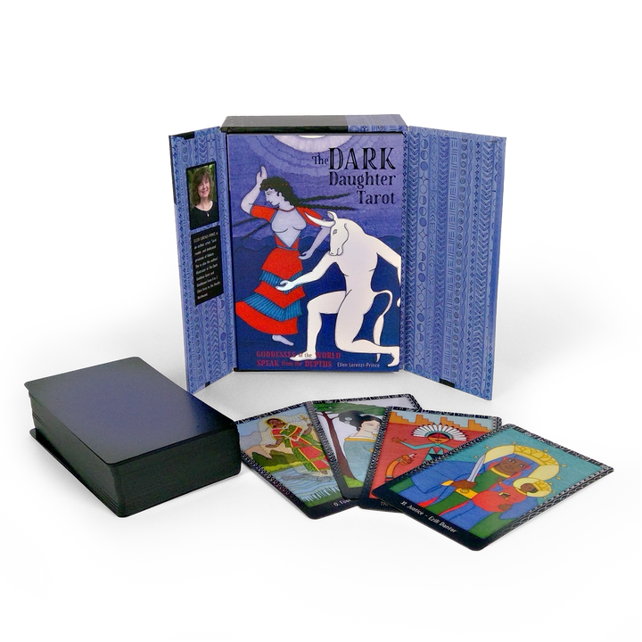 The Dark Daughter Tarot by Schiffer Publishing, Ltd. is shown with its box open, booklet inside, and four vibrant cards—reflecting the divine feminine—spread out in front, while the rest of the deck sits neatly stacked.