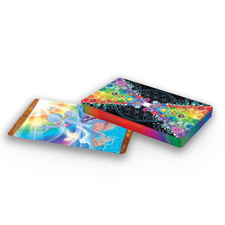 The Patch Tarot by Schiffer Publishing, Ltd. features a neatly stacked deck with vibrant, colorful backs. A face-up card displays a whimsical, rainbow-toned illustration with abstract figures and cosmic motifs inspired by Spirit Science.