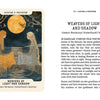 Two long-haired women in flowing dresses sit on grass beneath radiant trees at dusk, weaving together amid woodland—evoking Nordic folklore and the magic of Schiffer Publishing, Ltd.'s Nordic Forest Rituals Oracle Cards. Card shown: Weavers of Light and Shadow.