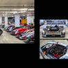 Audi's Historic Fleet from Schiffer Publishing, Ltd. showcases prototype cars parked in a spacious indoor garage, with close-ups featuring a silver open-top race car’s standout design and engine details.
