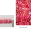 Two artworks by Portia Munson—left: a display of pink objects; right: an immersive room with pink items—recall NYC subway art featured in "Museum in Transit" by Schiffer Publishing, Ltd.