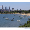 Enjoy a sunny view of Edgewater Beach in Cleveland, with boats, crowds, and the city skyline—captured in "Cleveland" by Schiffer Publishing, Ltd., perfect for photo book lovers or as a standout Cleveland souvenir.