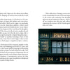 In "The Little Book of French Signs" by Schiffer Publishing, Ltd., one page offers a black-on-white introduction, while the opposite page presents a photo of vintage French "Papeterie - Marquinerie" signage above a storefront.