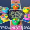 Colorful Trivial Pursuit pieces on a game board, each with unique wedges, rest among category spaces. Below reads "ENTERTAINMENT & SPORTS," highlighting Schiffer Publishing, Ltd.’s "Iconic Objects of the 1980s.