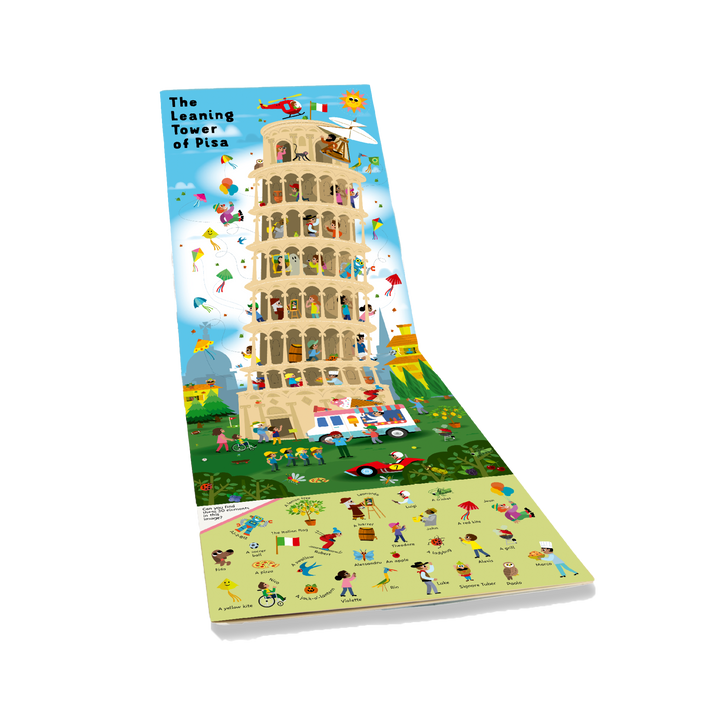 Discover Monuments of the World by Schiffer Publishing, Ltd.—an illustrated pop-up featuring playful people and animals exploring famous landmarks like the Leaning Tower of Pisa, perfect for seek-and-find fun under a bright blue sky and on green grass.