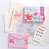 The Watercolor the Easy Way Paint-Your-Own Watercolor Cards Friends kit by Schiffer Publishing, Ltd. includes 12 patterned cards, envelopes, and a 9-color palette—everything needed to create personalized watercolor notecards.