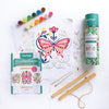ColorMaps Paint-by-Number Relaxing Garden by Schiffer Publishing, Ltd. features a butterfly and floral design, paints, brushes, instructions, and rolled tube container. Some floral areas are partially painted and all items are on a white surface.
