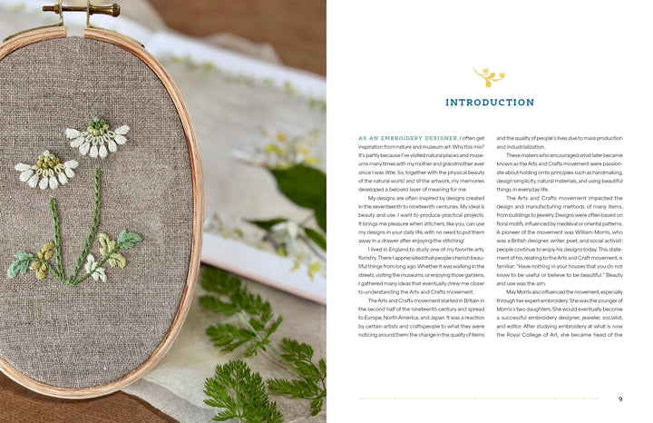 An embroidery hoop displays white and yellow daisies, inspired by Noriko Livingstone’s designs. To the right is "Wild Embroidery" by Schiffer Publishing, Ltd., with decorative text and green fern leaves scattered below.