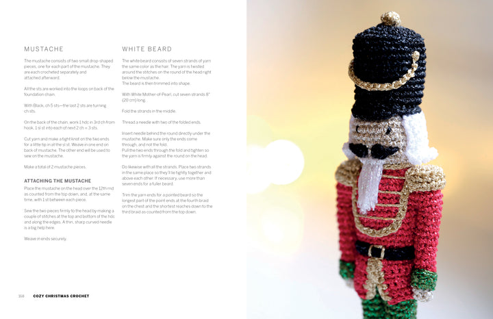 The "Cozy Christmas Crochet" book by Schiffer Publishing, Ltd. features a crocheted nutcracker doll with a black hat, white beard, red and gold uniform, and green sleeves; mustache and beard pattern instructions appear on the left page.