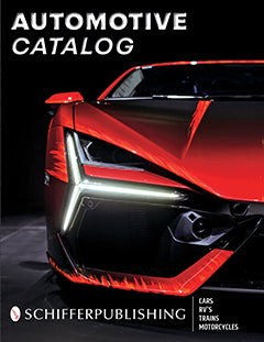Close-up of the front of a red sports car with sharp, angular headlights on the cover of a publication titled Automotive Catalog by Schiffer Publishing. The cover mentions cars, RVs, trains, and motorcycles.