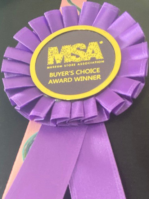 Celebrate excellence in art history for kids or modern art movements with Let's Go to the Museum by Schiffer Publishing, Ltd.—a MSA Buyers Choice Award Winner, featuring a purple ribbon and bold yellow text on a round center.
