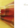 The "Jewelry for Your Table" ring by Schiffer Publishing, Ltd. features a sparkling sunflower shape with green leaf details, displayed on a blurred yellow and plaid background beside a table of contents on a white page.