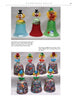 Two photos from "Glass Bells from Around The World" by Schiffer Publishing, Ltd. show three clown bells in green, red, and blue on top, and seven unique mosaic-patterned clown bells with distinct faces on the bottom for collectors.
