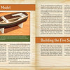 A two-page spread from Schiffer Publishing, Ltd.’s "How to Build a Flatiron Skiff" features a photo of a wooden model skiff and text on wooden boat building, including "Building a Model" and "Building the Five Subassemblies.
