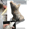 A person uses sandpaper to smooth a small coyote soapstone carving, as shown from multiple angles in "Carving a Coyote in Soapstone" by Schiffer Publishing, Ltd.