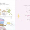 A young girl with brown pigtails licks pink frosting off a spoon in a kitchen full of cookie dough, as a green frog sits nearby. The right page features text from "I Am Not a Princess!" by Schiffer Publishing, Ltd.