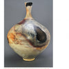 Pit Firing Ceramics by Schiffer Publishing, Ltd. showcases a wheel-thrown ceramic vase with a narrow neck, round body, earthy tones, smoky pit-firing patterns, and inscribed text—blending modern and ancient firing techniques.