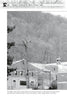 At the United States Military Academy, a building rises amid trees—setting for ghostly tales explored in "Fright to the Point: Ghosts of West Point" by Schiffer Publishing, Ltd., where haunted legends linger across generations.