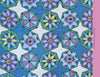 Terry Cloth by Schiffer Publishing, Ltd. features geometric hexagons and star-shaped floral patterns in blue, green, yellow, pink, and white on a blue background, with “Florals & Geometrics” displayed on the right side.