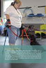 A woman with two canes holds a leash for her attentive black poodle-mix service dog, who sits and looks up at her—one of many inspiring stories in "Ambassador Dogs" from Schiffer Publishing, Ltd.