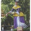 A statue of a woman holding a plate of food stands at Story Book Land, featured in "The Story of Story Book Land" from Schiffer Publishing, Ltd., celebrating the cherished amusement park near Atlantic City.