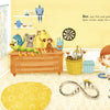 A sad, pale boy with red hair sits in a yellow, toy-filled room on the cover of King of Boredom by Schiffer Publishing, Ltd., surrounded by plush animals and toys—his uniqueness sets him apart, but he doesn’t seem to enjoy himself.