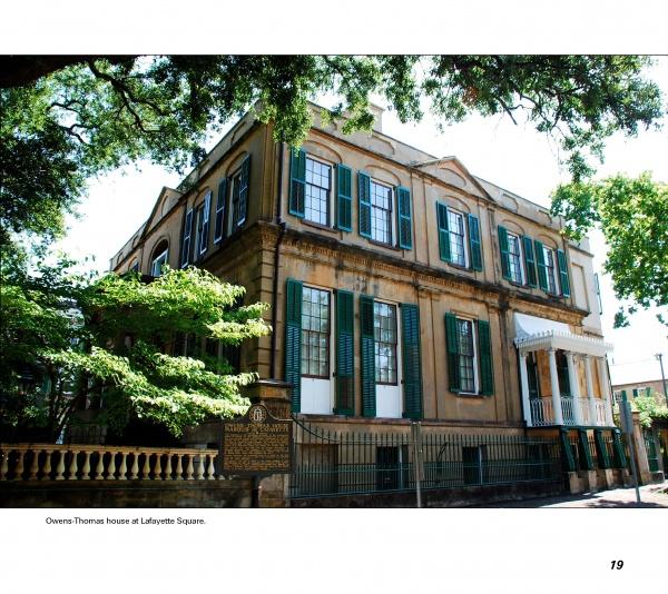 Featured in "Savannah Perspectives" by Schiffer Publishing, Ltd., a historic two-story house with green shutters and a white balcony stands in Savannah, Georgia, marked as a notable city landmark.