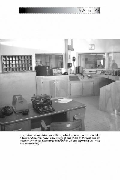 Black-and-white photo of the Alcatraz Island prison administration office, featured in Schiffer Publishing, Ltd.'s "Ghosts of Alcatraz," shows a typewriter, desk, shelves, and equipment, evoking the site's haunted, storied history.