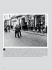 The Leibstandarte in Greece" by Schiffer Publishing, Ltd. features a black-and-white photo of a German soldier, likely from the Leibstandarte SS Adolf Hitler, leading troops through a Greek city street in 1941 as civilians look on.