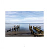 A wooden pier reaches into peaceful waters, showcasing the serene beauty of Chesapeake Bay—a featured scene in Schiffer Publishing, Ltd.'s "Maryland Landscapes.