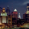 Capture the beauty of Philadelphia with Schiffer Publishing, Ltd.'s "Philadelphia," showcasing the city skyline at dusk—illuminated skyscrapers like the PSFS building and Liberty Place shine against a dramatic night sky. Ideal for photography lovers.