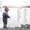 A toddler in cozy knitwear stands on a rocky lakeshore, gazing at the water with snowy mountains beyond. To the right, the table of contents for Knitting for Little Sweethearts by Schiffer Publishing, Ltd. is superimposed on the image.