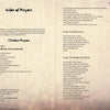 A book spread from Paranormal Canadian Tales by Schiffer Publishing, Ltd. shows textured pages: the left lists Christian prayers like the Lord's Prayer and Psalm 23; the right features prayers used by paranormal investigators, such as those for breaking curses.
