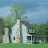 Experience the charm of rural mountain retreats with "West Virginia" by Schiffer Publishing, Ltd.—a scenic photography collection featuring a historic white wooden house with stone chimneys, a front porch, and a lush green lawn under cloudy skies.